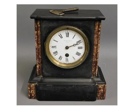A Victorian mantel clock with marble trim, Searle &amp; Sons, 8.75in tall 