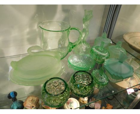 A quantity of early 20thC. &amp; art deco uranium glass &amp; similar items, mermaid candlestick 8.5in tall