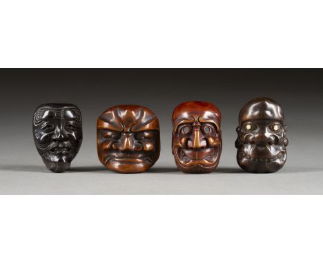 VIER HOLZGESCHNITZTE NETSUKE VON MASKEN Japan, 19. Jahrhundert Holz. H. 4.2-4.5 cm. Das Konvolut umfasst ein Netsuke von Okin