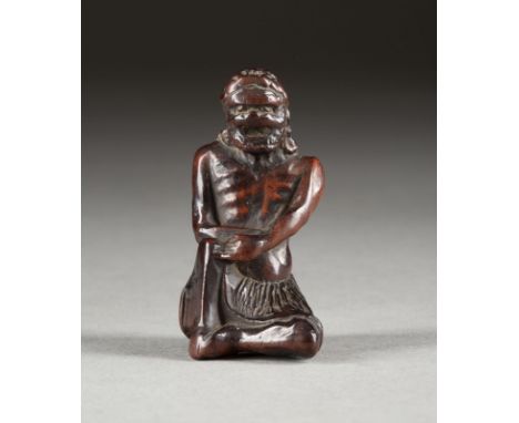 EIN FEINES HOLZGESCHNITZTES NETSUKE EINES SENNIN Japan, 18. Jahrhundert Holz. H. 4.7 cm. Das Netsuke ist als ein sitzender un