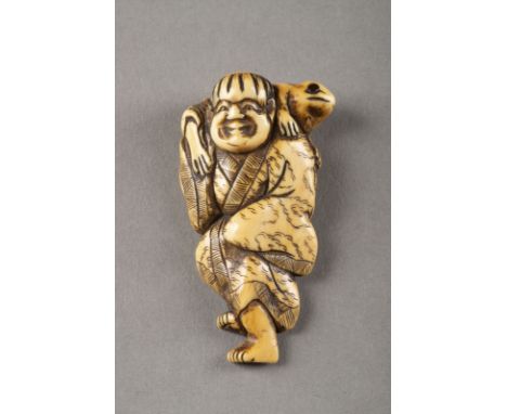 EIN GESCHNITZTES NETSUKE DES GAMA-SENNINS AUS ELFENBEIN Japan, 18. Jahrhundert Elfenbein. H. 5.7 cm. Das Netsuke ist als Gama