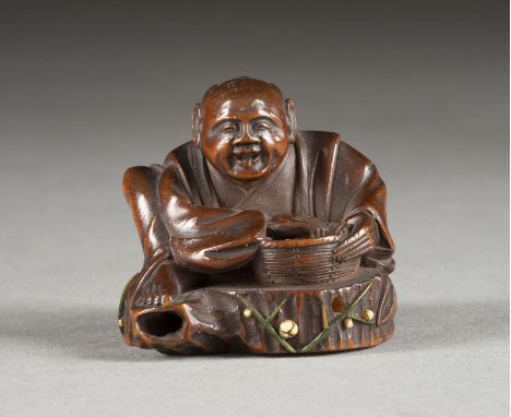 EIN HOLZGESCHNITZTES NETSUKE VON HANASAKA JIJI Japan, 19. Jahrhundert Holz. H. 3.5 cm. Das Netsuke ist als Hanasaka Jiji gesc