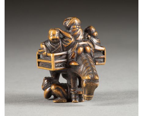 EIN FEINES HOLZGESCHNITZTES NETSUKE VON SAMBO KOJIN Japan, 19. Jahrhundert Holz. H. 4.1 cm. Das Netsuke ist als reitende Mutt