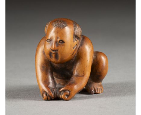 EIN HOLZGESCHNITZTES NETSUKE EINES HOCKENDEN KARAKO Japan, 19. Jahrhundert Holz. H. 3.8 cm. Signiert auf der Unterseite "Shom