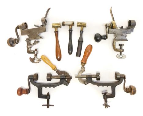 Reloading tools, including four shotgun reloading tools one marked A.G 12, also three powder measures.