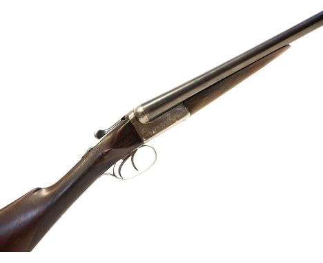 Army and Navy CSL boxlock ejector 12 bore shotgun for a left-handed shot, with cast on stock, 28 inch barrels choked full and