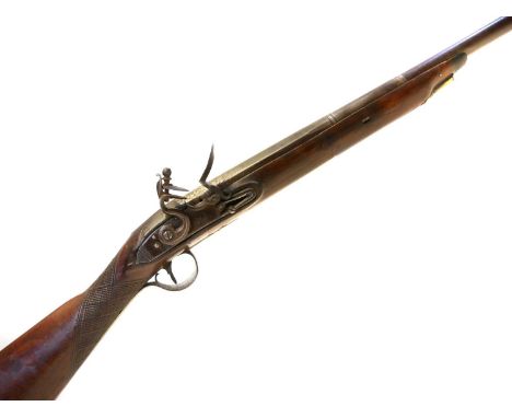 Flintlock 16 bore sporting gun by Milner, 37 inch Spanish form barrel, lock engraved with maker's name and fitted with roller