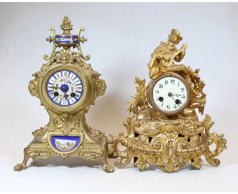 A 19th century French eight-day gilt metal and porcelain mounted mantel clock, profusely decorated with flora and fauna, h.36