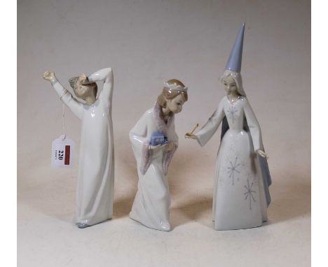 A Lladro Spanish porcelain model of a young girl with conical hat with wand in her hand, having printed mark verso, height 28