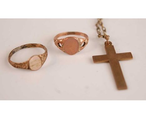 A 9ct gold cross pendant, on gilt metal neck chain; together with two gilt metal signet rings (4)Condition report: The cross 