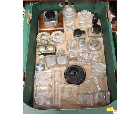 A collection of assorted Victorian and later glass inkwell bottoms