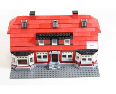 A Lego model of a two-storey building 