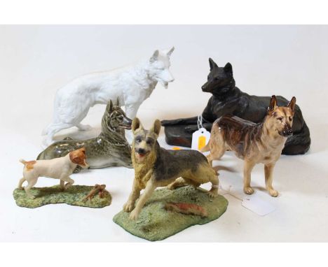 A Royal Doulton model of a German Shepherd HN 116T, height 16cm, together with a bronzed resin model of a recumbent dog, sign