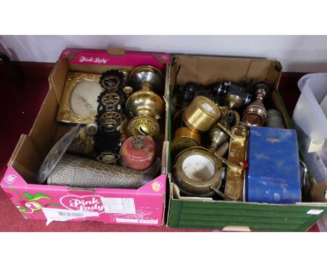 Two boxes of miscellaneous items to include  brass oil lamp, brass photo frame, horse brasses, coat hook etc