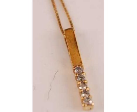 A modern 18ct gold diamond point set pendant, on finelink neck chain, pendant length 15mm, gross weight 1.2g