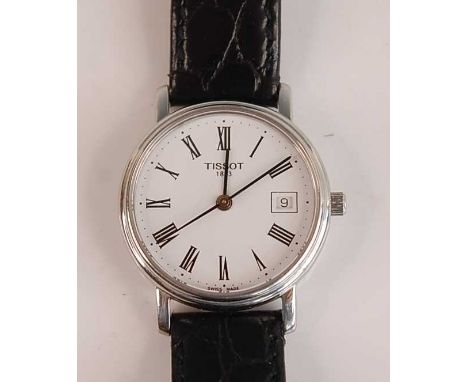 A lady's Tissot steel cased quartz dress watch, with signed Roman date dial, dia.26mm, on black leather braceletCondition rep