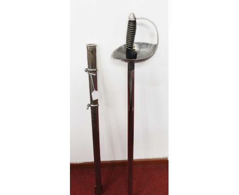 A reproduction cavalry type sword, having a fullered blade, with etched bowl hilt and wirebound leather handle, in steel scab