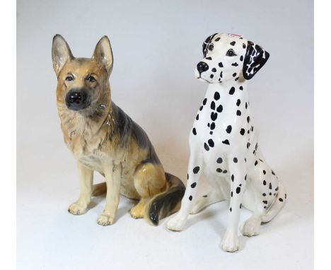 A large Beswick model of a Dalmation, h.35cm; together with a Beswick model of a German Shepherd, h.35cm, both in seated pose