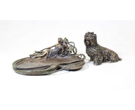 An Art Nouveau style resin dish, mounted with a reclining lady and decorated with stylised foliage, w.25cm; together with a p