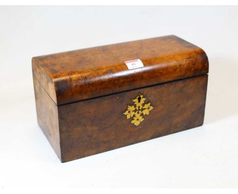 A Victorian burr walnut tea caddy, the domed lid lifting to reveal a cut glass mixing bowl with caddy spoon, flanked by twin 