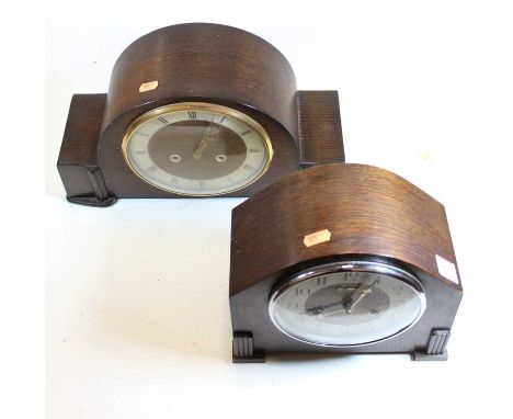 A 1950s Smith's oak cased mantel clock, having a silvered chapter ring with Roman numerals and eight-day movement; together w