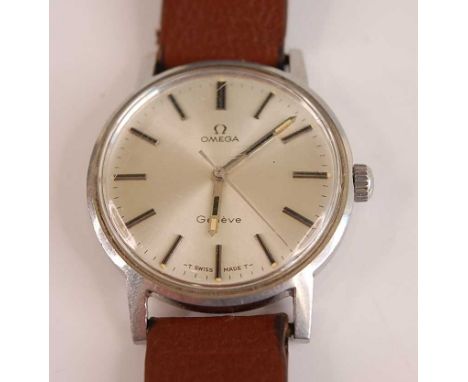 A gent's steel cased Omega Geneve manual wind wristwatch, having signed silvered dial with baton markers, screw-down back cov