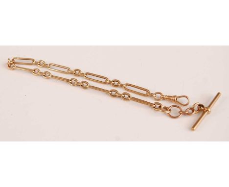 A 15ct gold trombone link watch chain, with clasp and 9ct gold Albert, gross weight 32.8g, length 32cm Condition report: Thre