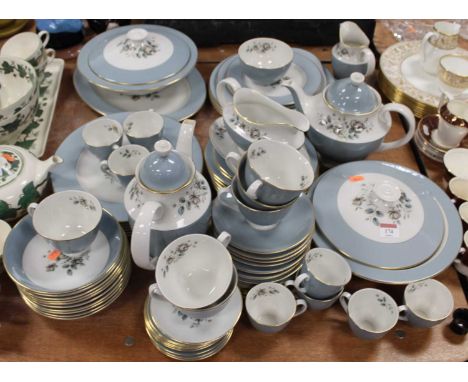 A Royal Doulton 10-place setting tea and dinner service in the Rose Elegans pattern 