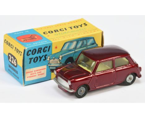 Corgi Toys 226 Morris Mini Minor - Metallic Maroon, lemon interior, silver trim, cast hubs - Excellent Plus in a Good Plus bl