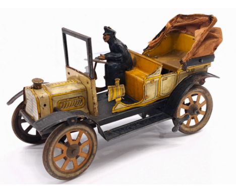 Fischer open tourer, early 1900's, tinplate, cloth hood (some holes), glazed windscreen,&nbsp; clock work with fixed key mech