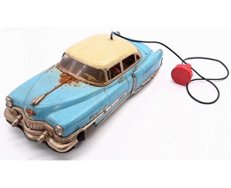 Gama (Germany) tinplate Cadillac, powder blue with cream roof (repainted), detailed tinprinted interior and steerable front w