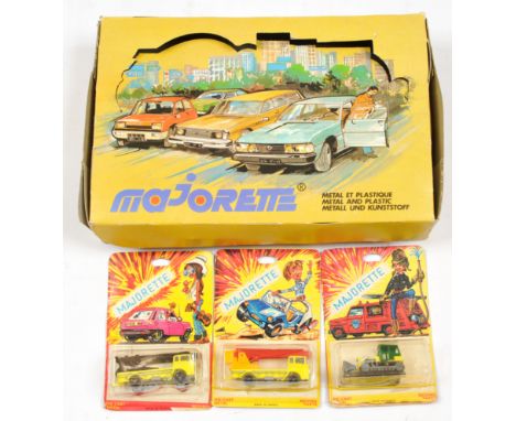 Majorette Counter Trade Pack comes with 3 x earlier blister card issues - Caterpillar Tractor Plus others - conditions are Go