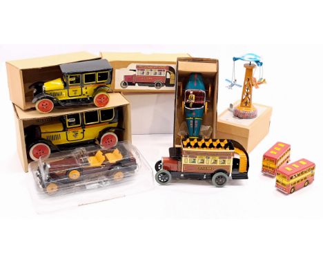 Tinplate group including: (1-2) Paya large and small taxi; (3) Bus, made in China; (4) Bugatti T-35 Racer, made in China; (5)