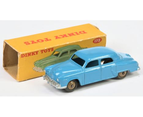 Dinky Toys 172 Studebaker Land Cruiser - Mid-Blue, fawn rigid hubs, silver trim - Good Plus in a Poor yellow and red carded p