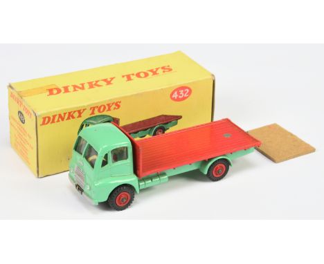 Dinky Toys 432 Guy Warrior - Turquoise Cab and chassis, red flat back and supertoy hubs, silver trim and with tow hook - Good