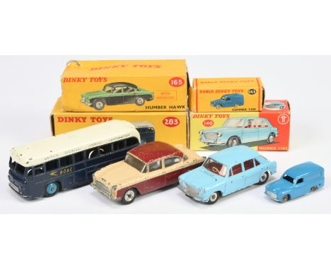 Dinky Toys A group Of 4 - (1) 140 Morris 1100 - Light blue, (2) 165 Humber Hawk Two-Tone green and black, (3) 283 "BOAC" Coac