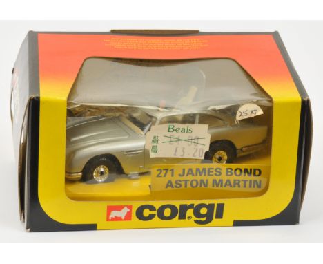 Corgi Toys 271 "James Bond" Aston Martin DB5 (1/36th) - Flat silver body with harder to find ivory interior with "James Bond 