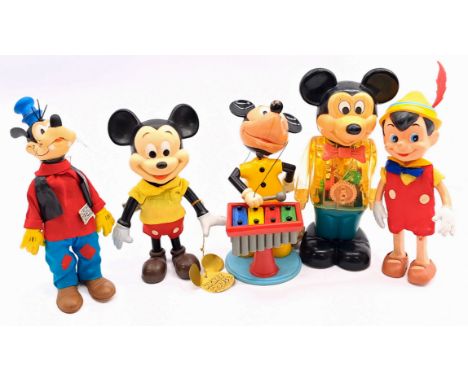 Disney group including: poseable figures, Mickey Mouse Xylophone playing puppet, Gabriel Mickey Robot, Good to Good Plus; (5)