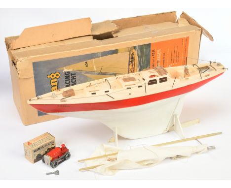 Triang pair including: (1) Triang 24" Racing Yacht, Ocean Cabin Racer, plastic scale model has white hull, cream deck and sup