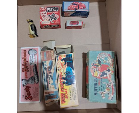 Tinplate and plastic novelty group including:&nbsp; Muffin the Mule Toy Television set; Penguin Tugboat Annie; Marx Petrol Wa