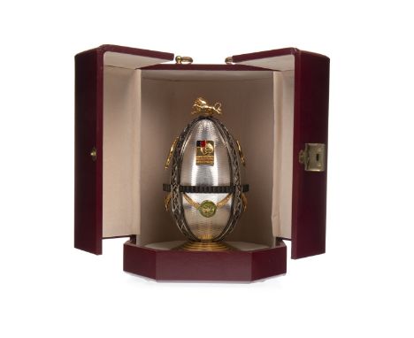 THE JIMMY JOHNSTONE FABERGE EGG BY SARAH FABERGE, number 18 of a limited edition of 19. The lion is presented as a finial in 