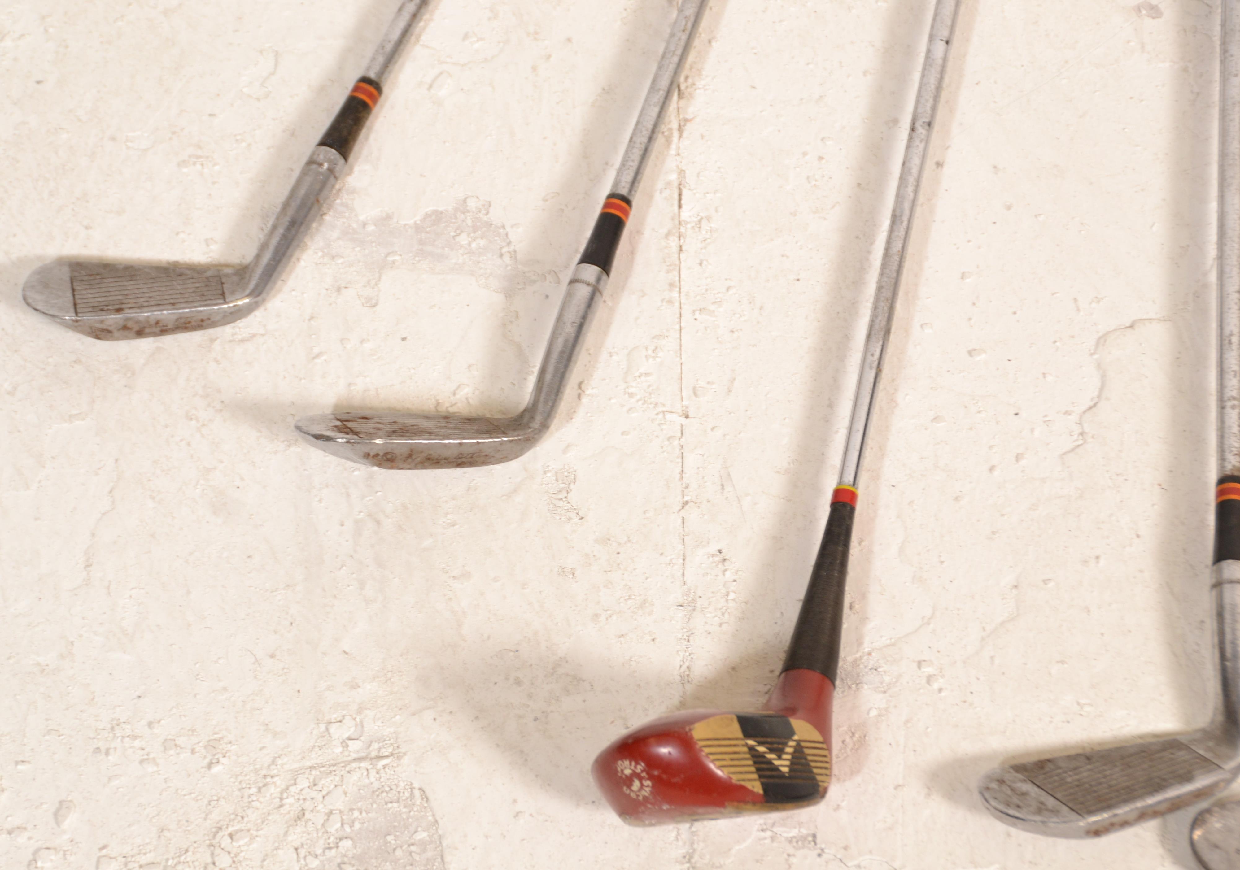 A set of vintage golf clubs most by Dai Rees, a John Jacobs driver, a