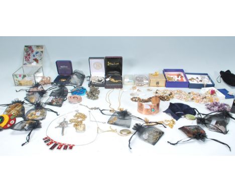 A large collection of vintage costume jewellery mostly being contained in original packaging to include a selection of demi p