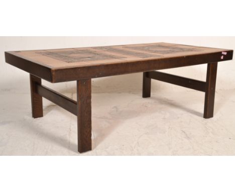 A 20th Century Danish retro vintage tile topped coffee table of rectangular form having a brutalist geometrical designed tile