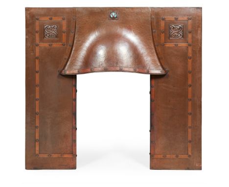 ENGLISH SCHOOL ARTS &amp; CRAFTS FIRE SURROUND, CIRCA 1900 copper, with applied Ruskin roundel and repoussé decoration(110cm 