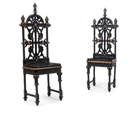 ATTRIBUTED TO CHRISTOPHER DRESSER FOR COALBROOKDALE IRONWORK COMPANY PAIR OF AESTHETIC MOVEMENT cast iron, painted black with