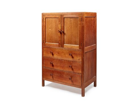 HEAL &amp; SON, LONDON TALL BOY, CIRCA 1930 oak, enclosing a single shelf above three drawers, bears makers label to top draw