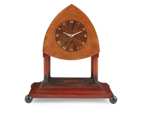Y AMSTERDAM SCHOOL MANTEL CLOCK, CIRCA 1920 burr and specimen woods, with mother-of-pearl inlaid decoration(32cm wide, 36.5cm