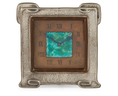 LIBERTY &amp; CO., LONDON STRUT CLOCK, CIRCA 1910 pewter frame with copper and enamel dial, stamped maker's mark verso TUDRIC