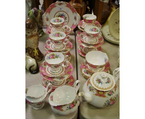 A Royal Albert tea service for ten Lady Carlyle pattern comprising teapot, milk jug, sucrier, cake plate, tea cups, saucers a